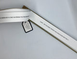 Thin, long artist book, with a tan cover and white pages each with a thought provoking question.