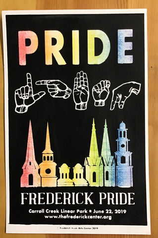 Poster with a black background featuring sign language hands that spell out LGBTQ in white. Above and below the hands are rainbow letters that says PRIDE and an image of the Frederick Spires.