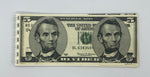 A reconstructed $5 bill with two Lincoln faces!
